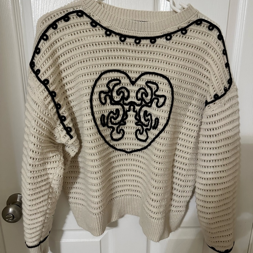 Cream Open-Knit Crewneck Sweater with Black Heart Motif